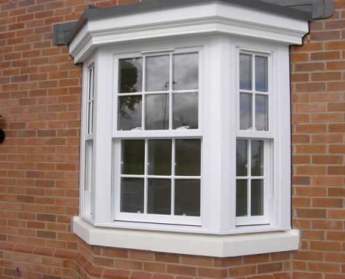 White vertical sash window