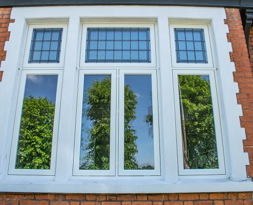 White timber casement window