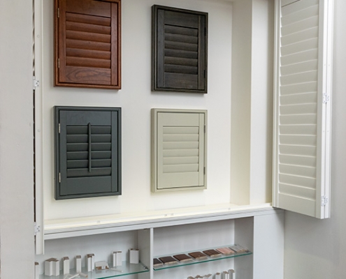 Different coloured window shutters