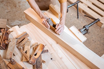 Experienced carpenter working on heritage windows