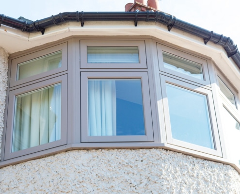 Grey timber casement windows installation in Winchmore Hill, Enfield